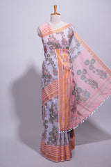 Lavender linen saree withbodyfloral and traditional motifs with a contrastingpallu striped zari border and tassel along with contrast blouse