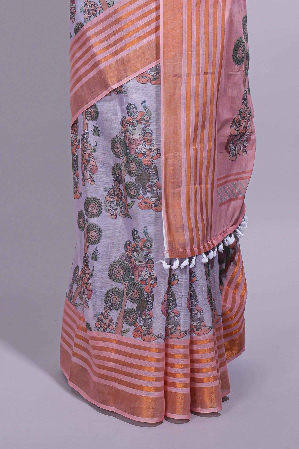 Lavender linen saree with  body  floral and traditional motifs with a contrasting  pallu striped zari border and tassel along with contrast blouse