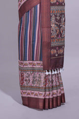 Maroon linen saree with vertical stripe patterns and traditional floral artistic motifs with intricate printed borders along with contrast blouse piece