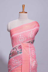 Linen saree with a pink colourfeaturing floral patterns with a contrastfloral printed pallu and zari border with tassel along with contrast blouse