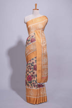 Linen saree with a orange colour  featuring floral patterns with a contrast  floral printed pallu and zari border with tassel along with contrast blouse