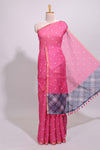 Pink round motifs linen saree with self zari border and contrast checked blouse