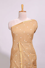 Sandal round motifs linen saree with self zari border and contrast checked blouse