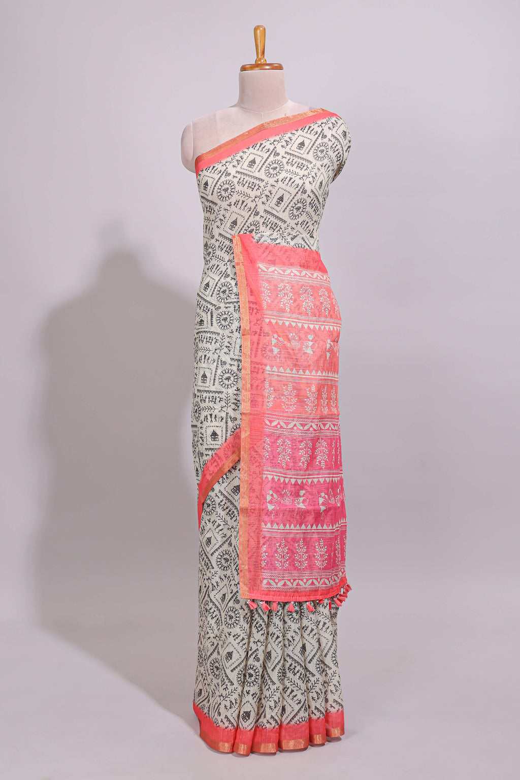 Cream warli design linen cotton saree with contrast zari border and contrast printed blouse