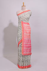 Cream warli design linen cotton saree with contrast zari border and contrast printed blouse