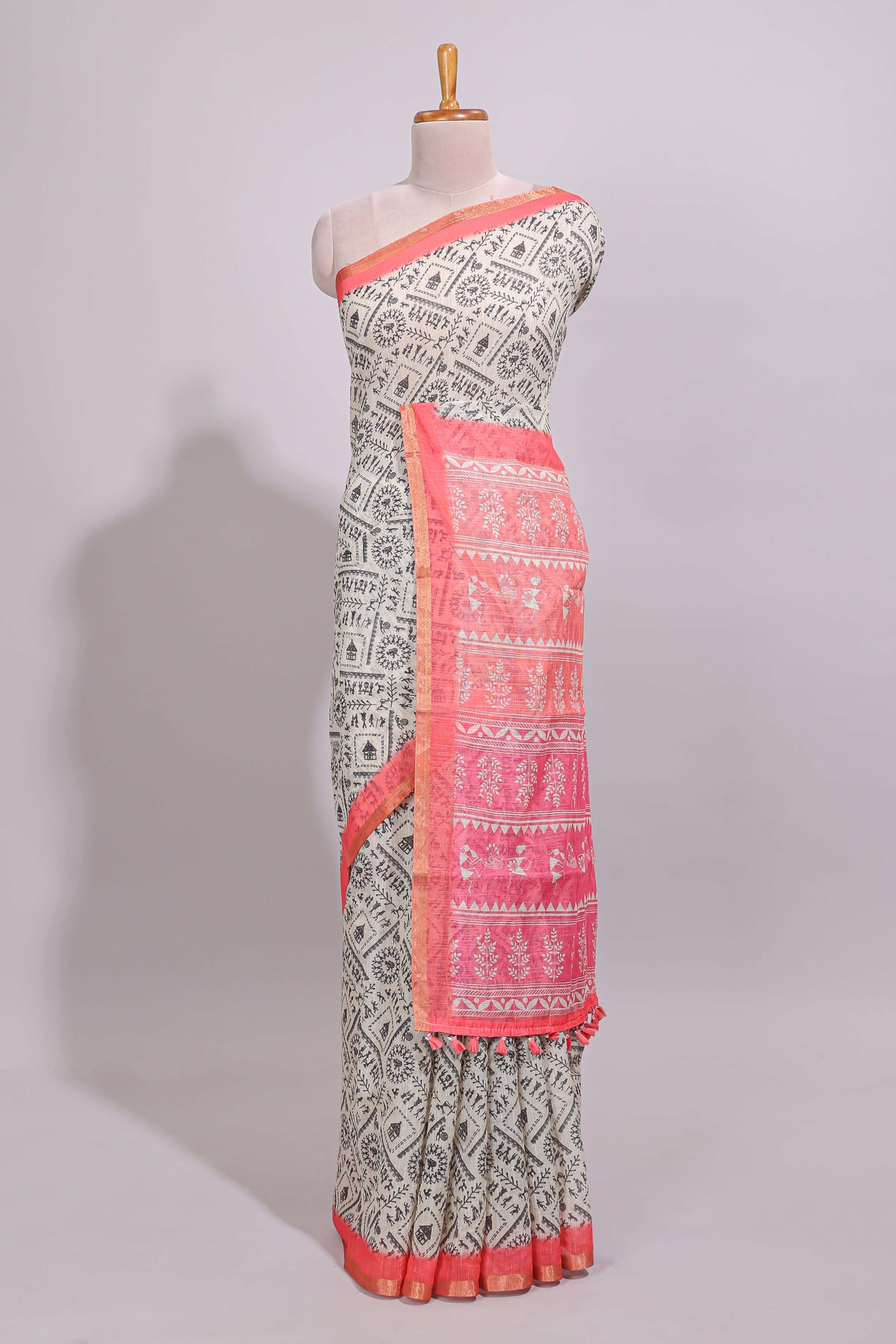 Cream warli design linen cotton saree with contrast zari border and contrast printed blouse