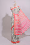 Cream warli design linen cotton saree with contrast zari border and contrast printed blouse