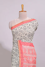 Cream warli design linen cotton saree with contrast zari border and contrast printed blouse