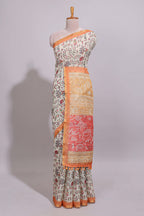 Cream warli design linen cotton saree with contrast zari border and contrast printed blouse