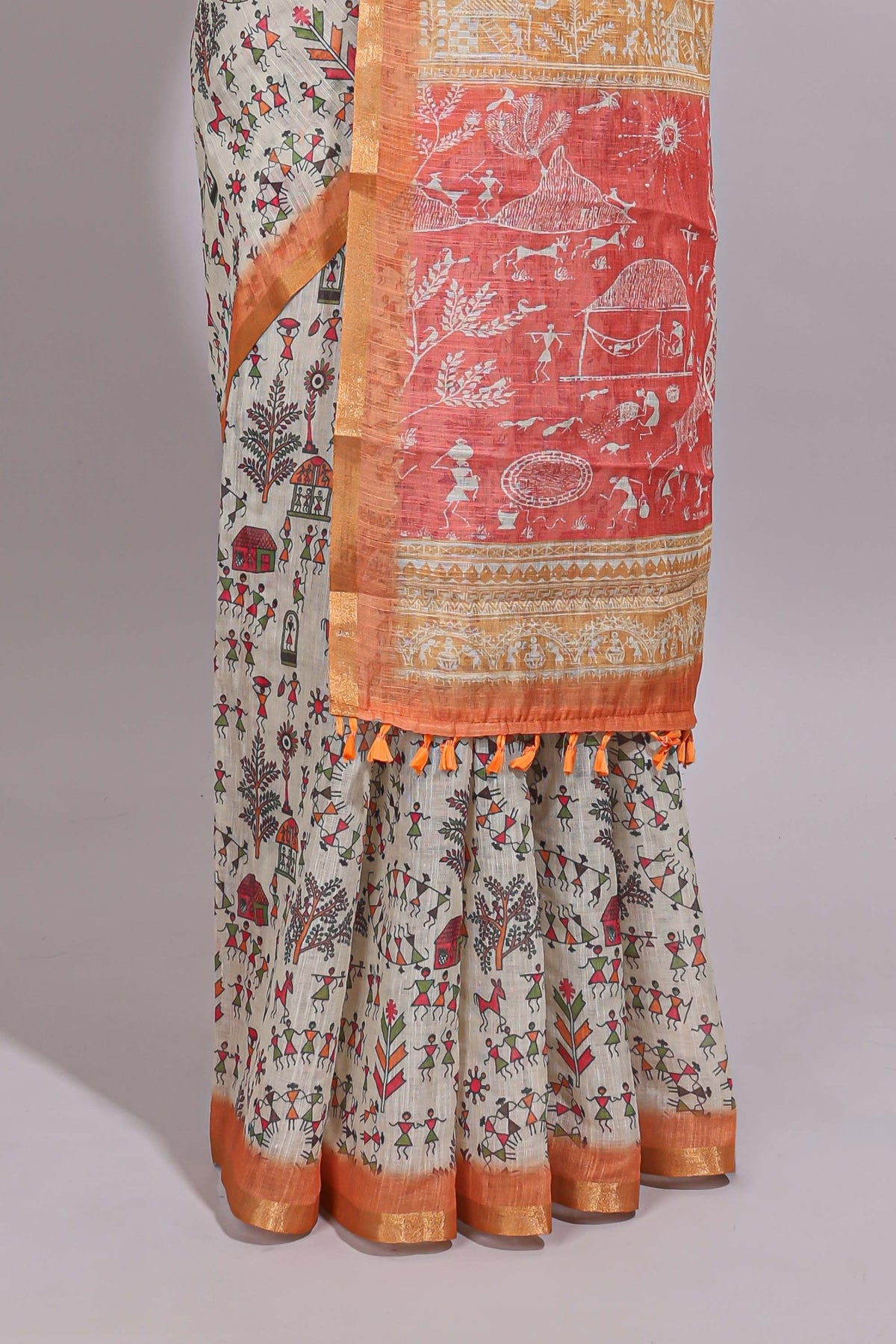 Cream warli design linen cotton saree with contrast zari border and contrast printed blouse