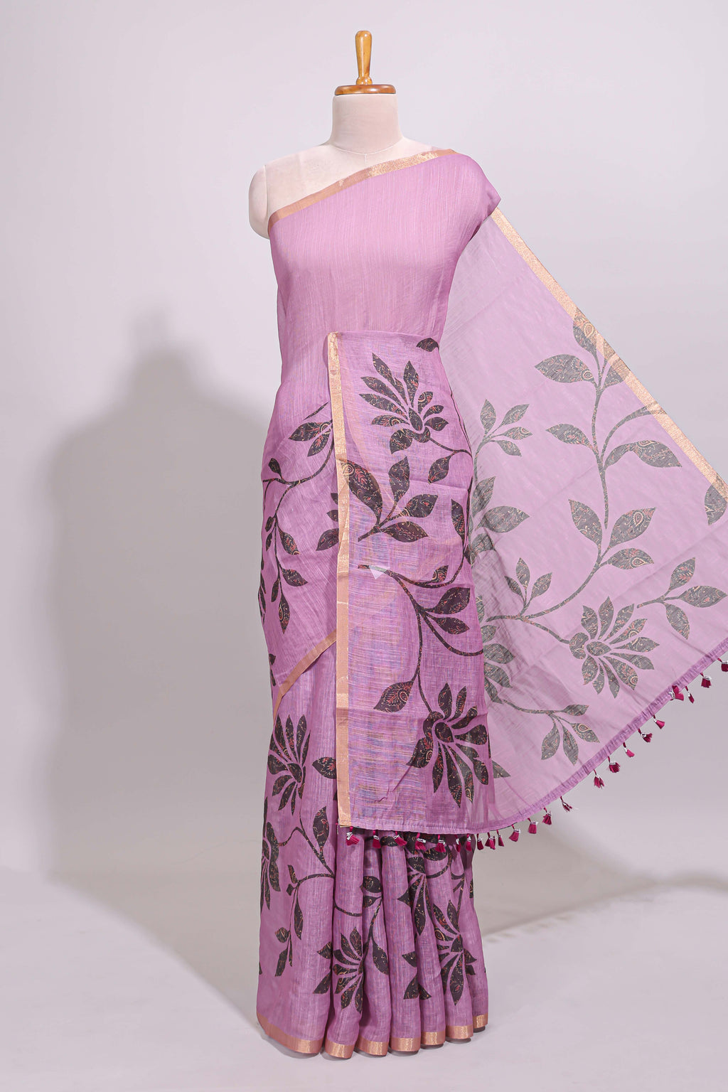 Mauve floral design linen cotton saree with self zari border and contrast floral print blouse