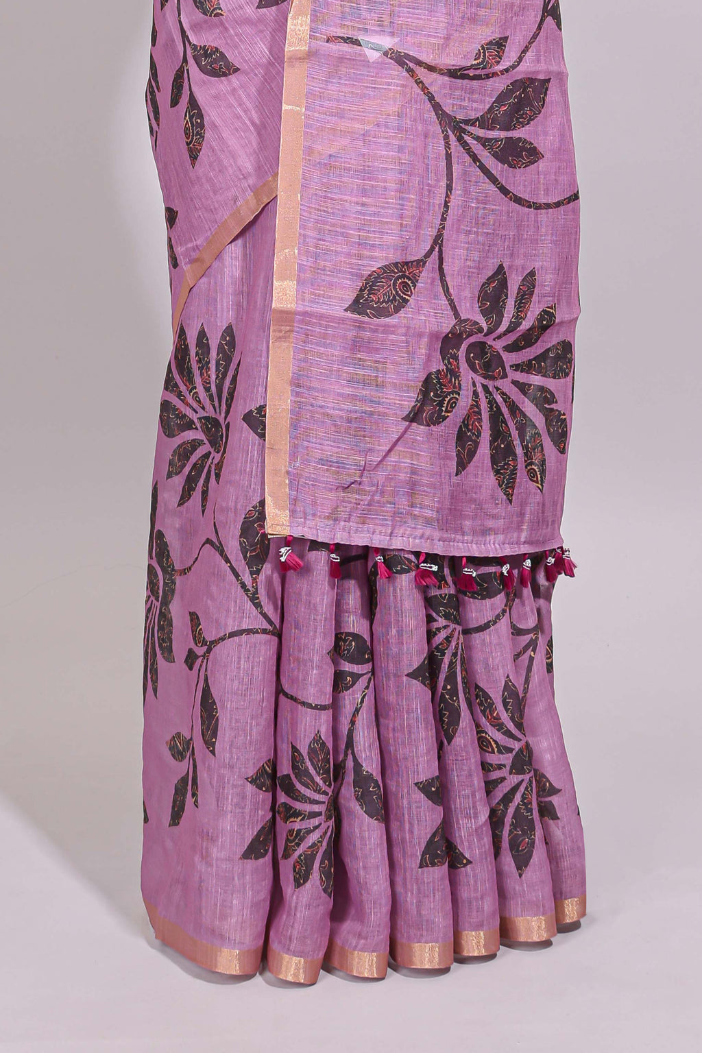 Mauve floral design linen cotton saree with self zari border and contrast floral print blouse