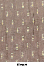 Green geometric ikkat design linen cotton saree with contrast zari border and printed blouse