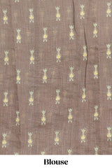 Green geometric ikkat design linen cotton saree with contrast zari border and printed blouse
