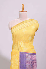 Yellow floral design linen cotton saree with self zari border and contrast printed blouse