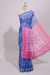 Blue floral design linen cotton saree with self zari border and contrast printed blouse