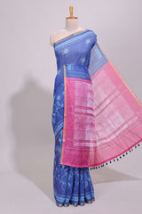 Blue floral design linen cotton saree with self zari border and contrast printed blouse