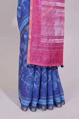 Blue floral design linen cotton saree with self zari border and contrast printed blouse