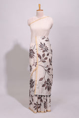 Cream floral design linen cotton saree with self zari border and contrast printed blouse