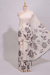 Cream floral design linen cotton saree with self zari border and contrast printed blouse