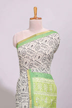 Cream warli design linen cotton saree with contrast zari border and printed blouse