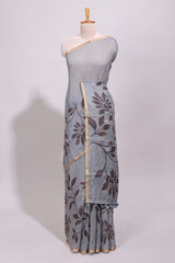 Grey floral design linen cotton saree with self zari border and contrast printed blouse