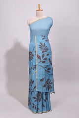 Blue floral design linen cotton saree with self zari border and contrast printed blouse