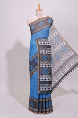 Blue crack design linen cotton saree with contrast zari border and printed blouse