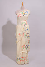 Cream olympic logo design linen cotton saree with self zari border and matching printed blouse