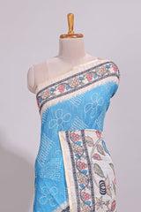 Blue floral print motifs linen cotton saree with contrast zari border and printed motifs blouse