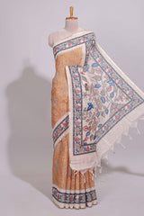 Orange floral print motifs linen cotton saree with contrast zari border and printed motifs blouse