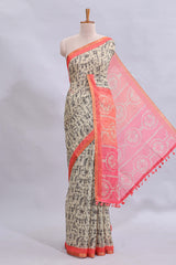 Beige tribal design warli print linen cotton saree with contrast pink zari border and chevron design blouse