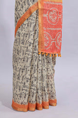 Beige tribal design warli print linen cotton saree with contrast orange zari border and warli design blouse