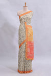 Beige tribal design warli print linen cotton saree with contrast orange zari border and floral design pallu