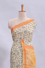 Beige tribal design warli print linen cotton saree with contrast orange zari border and floral design pallu