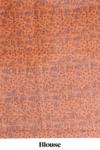 Beige tribal design warli print linen cotton saree with contrast orange zari border and floral design pallu