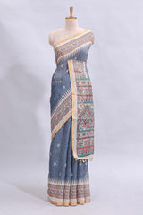 Steel blue checked motifs design linen cotton saree with contrast zari border and printed blouse