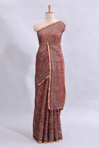 Maroon floral vines design linen cotton saree with self zari border and matching motifs blouse