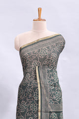 Bottle green floral vines design linen cotton saree with self zari border and matching motifs blouse