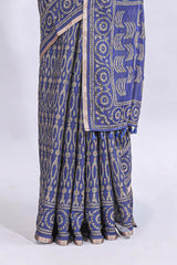 Blue ajrakh printed design linen cotton saree with self zari border and matching printed blouse