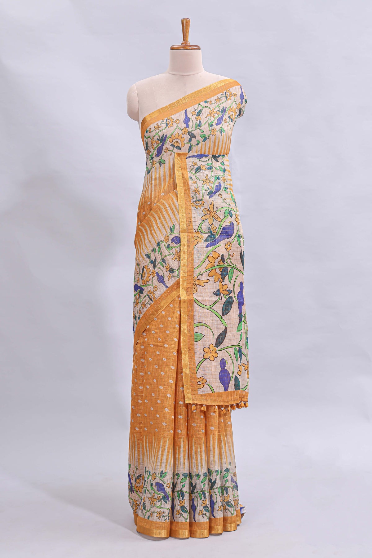 Mustard yellow checked motifs bottom floral & birds design linen cotton saree with self zari border and matching checked blouse