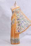 Mustard yellow checked motifs bottom floral & birds design linen cotton saree with self zari border and matching checked blouse