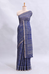 Blue floral design linen cotton saree with self zari border and matching printed blouse