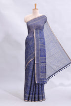 Blue floral design linen cotton saree with self zari border and matching printed blouse