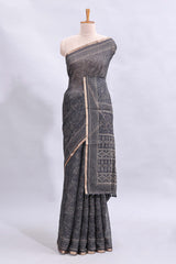 Black floral design linen cotton saree with self zari border and matching printed blouse