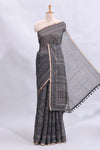 Black floral design linen cotton saree with self zari border and matching printed blouse