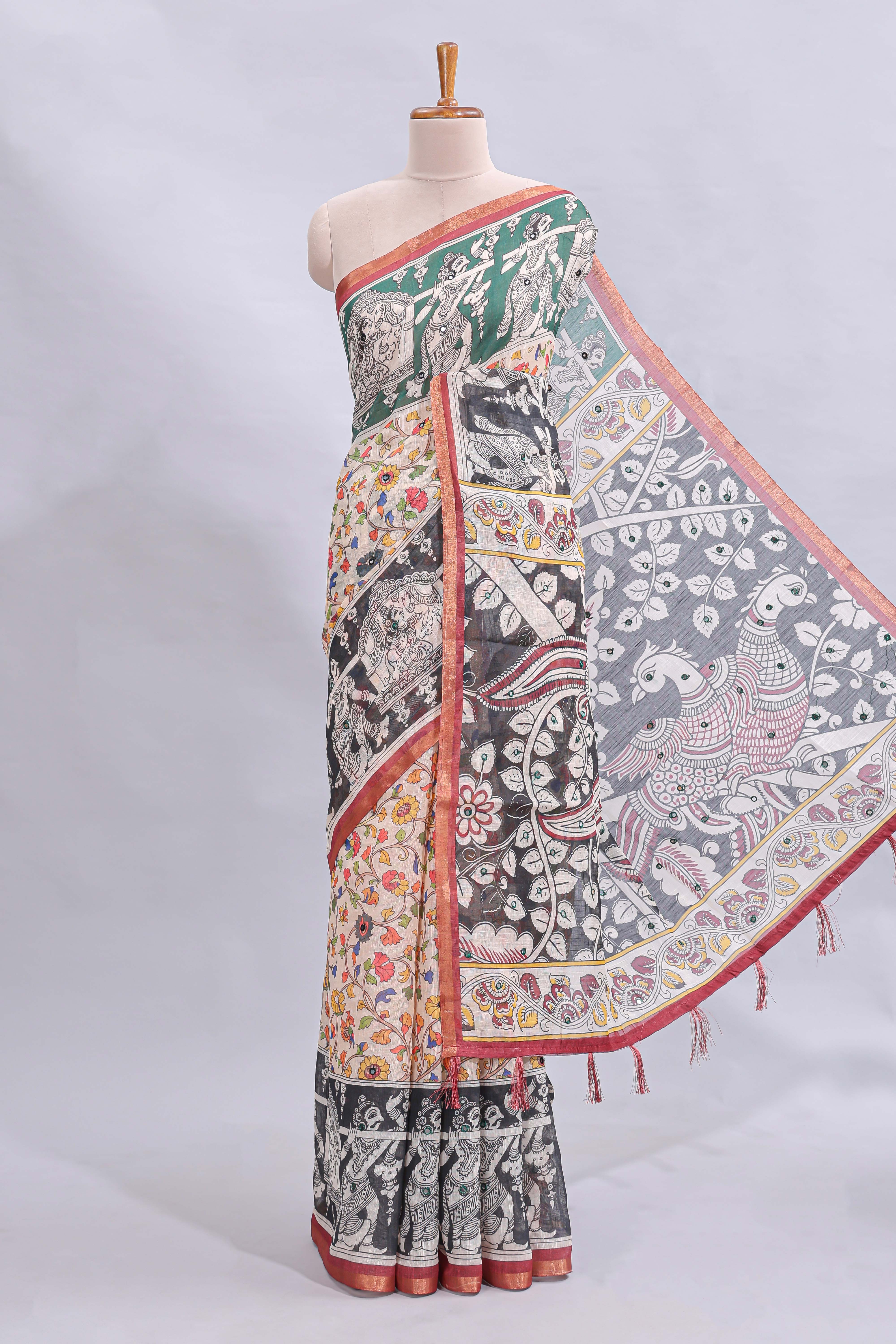 Multi color kalamkari style mirror embroidery work linen cotton saree with contrast zari border and floral blouse