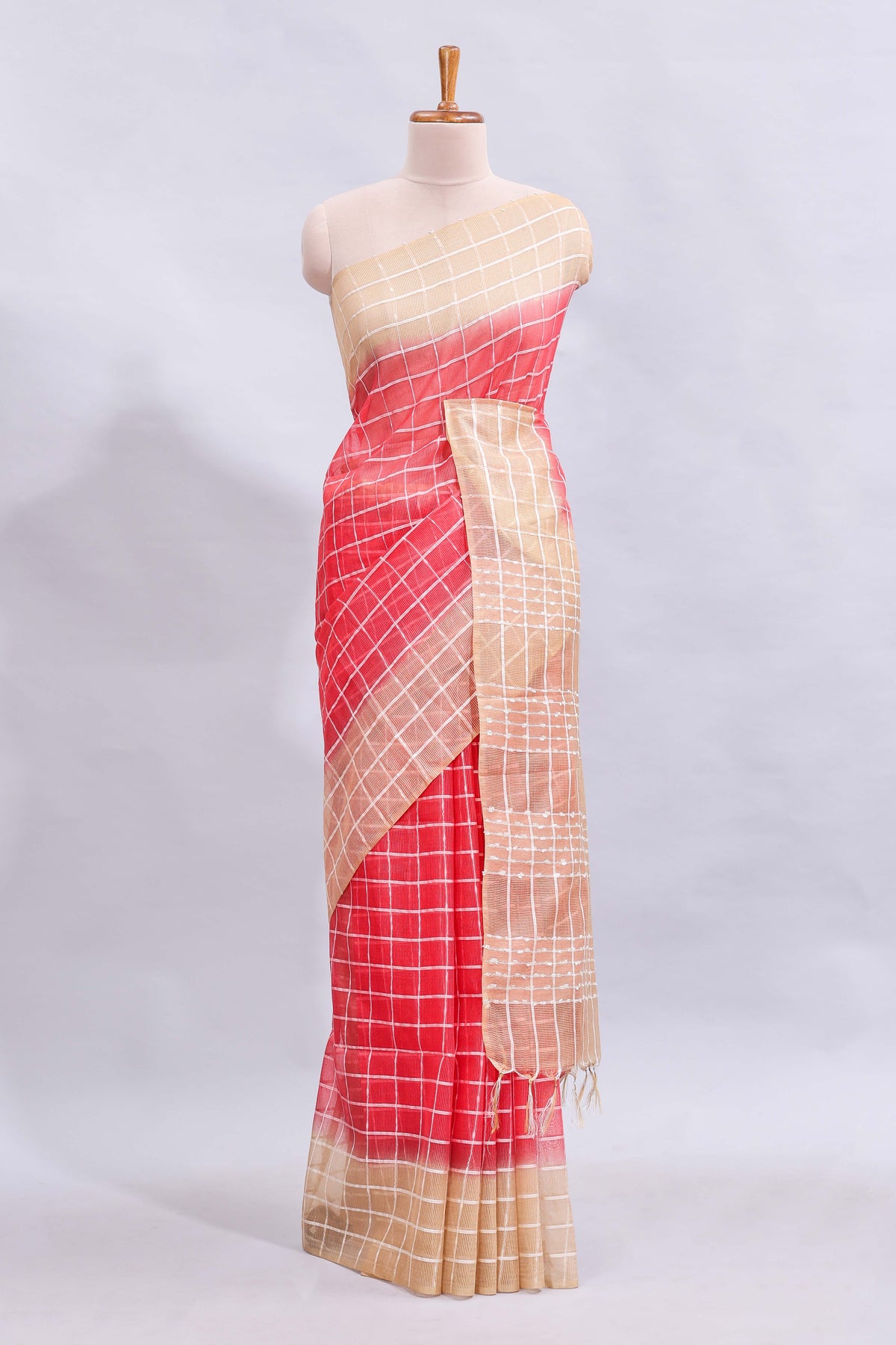 Pink checked linen cotton saree with contrast border and striped blouse