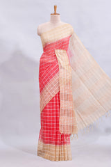 Pink checked linen cotton saree with contrast border and striped blouse