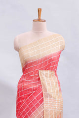 Pink checked linen cotton saree with contrast border and striped blouse